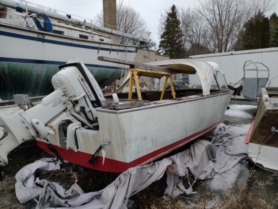 wooden boat with engine and trailer