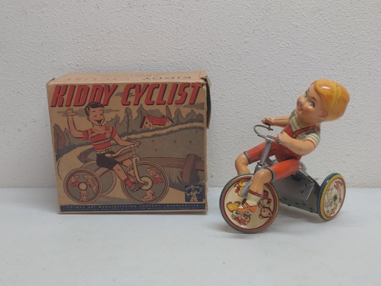 Unique Art Kiddy Cyclist Wind-Up Tin Toy