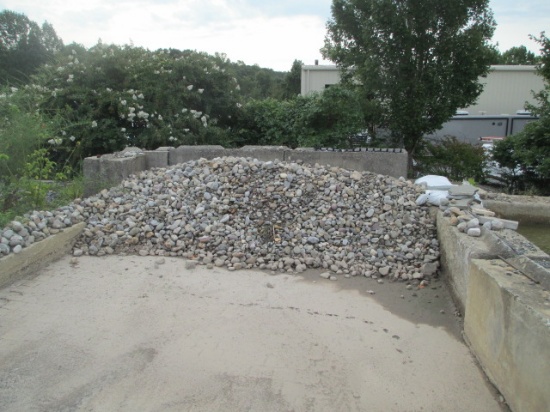 WASHED RIVER ROCK-ESTIMATED 3-3.5 TON-BUYER IS RESPONSIBLE FOR REMOVAL