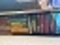 DRAWER LOT-IN TRAILER-TRUCK AND CAR REPAIR MANUALS-INLCUDES BOOKS ON TOP OF CABINET-APPROX. 30