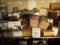 TABLE  & CONTENTS-PALM LEAF DINNER WARE/PLASTIC GLASSES/APPROX 27 BOXES TOTAL UNDER TABLE