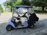EZ GO ELECTRIC GOLF CART WITH CANVAS TOP AND SIDE CURTAINS