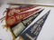 COLLECTION OF ASSORTED FELT PENNANTS FROM VACATION DESTINATIONS AND SCHOOL CROSSING FLAG