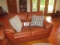 5 FT. CHESTNUT LEATHER SOFA W/2 THROW PILLOWS-LIKE NEW