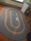 BRAIDED OVAL RUG  90 IN WIDE