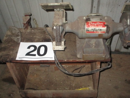 BENCH GRINDER AND VISE MOUNTED ON WOODEN STAND. DAYTON  12-706