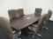 8 FT CONFERENCE TABLE WITH 6 CHAIRS. TABLE HAS A CRACK IN TOP LAMINATE. TABLE IS WIRED FOR TELECOM