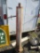SIGN POLE WITH SLIP STUB-64 IN. TALL. DENT IN BASE. MARKED 'REVERE'