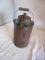 TINTED GLASS KEROSENE BOTTLE IN PROTECTIVE GALVANIZED HOLDER WITH CUT OUTS FOR SIGHT GAUGES-RARE