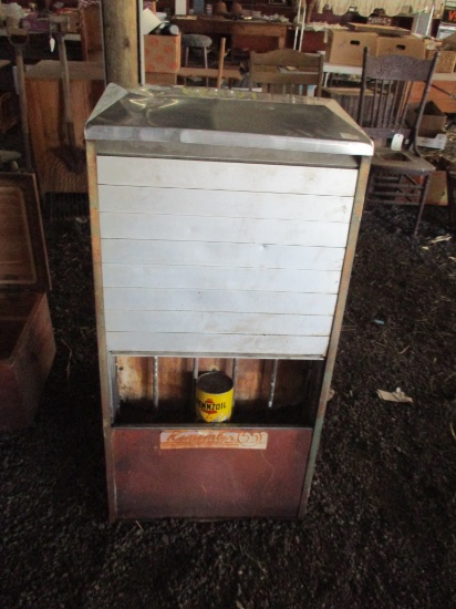 STATION ISLAND QUART CAN OIL DISPLAY-ROLL UP DOORS.