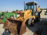 1050 575E NEW HOLLAND BACK HOE TLB C/A 4WD 16.9X28 7229HRS ''SALVAGE ROW, RUNS AND DRIVES AND OPE...
