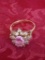 Womens 14K Gold Ring W/ Pink Center Stone & (14) Baggets