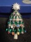 Swarovski crystal Rockefeller Christmas Tree Brooch/Pin. Has multi colored stones.