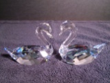 Pair of Swarovski crystal Flirting Swans. Hand signed by the artist Anton Hirtzinger.