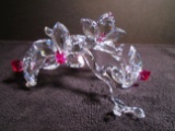 Swarovski crystal Orchids on a branch.