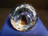 Swarovski crystal paperweight of Rockefeller Center Christmas Tree in color.
