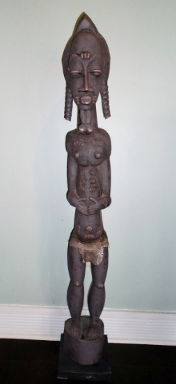 Standing Male African statue, wood carved man with cloth skirt.