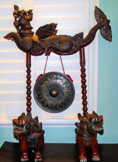 Wood carved dragons with Gong