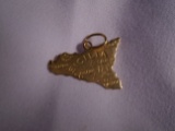 14kt yellow gold pendant, in the shape of Sicily.