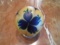 Orient & Flume Paperweight, blue and yellow flower design.