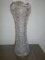 Crystal vase with crystal cut design.