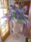 Large crystal Vase with purple and white silk flowers.