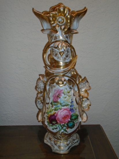 Large Paris porcelain vase with floral design and gold details.