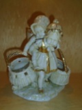 Porcelain figurine, girl carrying a little girl on her back