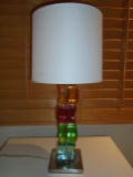 Lucite table lamp with multi colored cubes base.