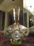 Crystal perfume bottle with aurora borealis colors