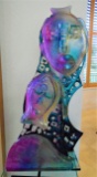 Glass statue of a man and woman, multi color painted glass sculpture