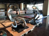 Large Stainless Steel sculptures with granite bases.
