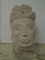 Hand sculpted clay, oriental head on an acrylic base.