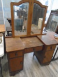 Antique wooden vanity with mirror.