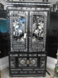 Oriental Armoire in black with mother of pearl inlays.
