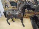 Leather Horse with saddle and other details.