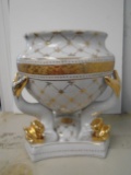 Handcrafted Fine Porcelain vase with fish design legs.