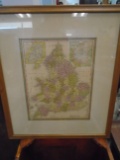 Print of the map of England in a frame.