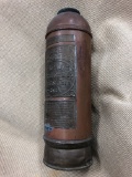 Antique brass metal Fire Extinguisher. Has an original metal label with description