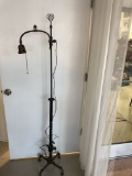 Antique, wonderfully preserved floor lamp with delicately designed metal/cast iron flowers s and lea