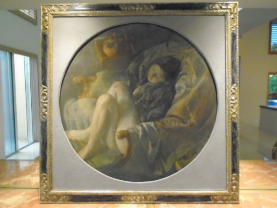 Oil painting in a frame, woman sitting in a chair