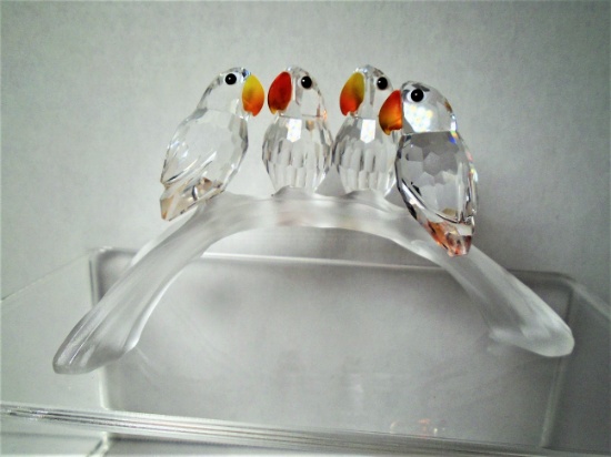 Swarovski crystal baby love birds on a frosted glass branch.