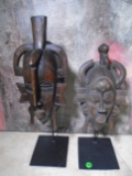 PAIR OF WOOD MASKS ON METAL STANDS