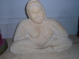 STONE SCULPTURE OF NUDE WOMAN BY LUTHER HAMPTON.