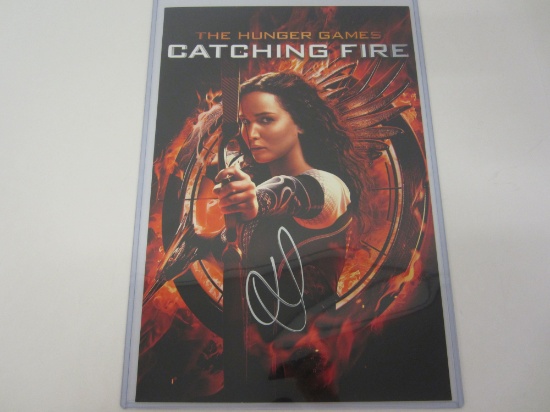 Jennifer Lawrence "THE HUNGER GAMES"  signed autographed 11x17 Photo Certified Coa