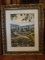 Landscape scene oil painting in a gold frame. Hand signed by the artist.