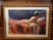 Embellished Gicle of a nude woman laying down, in a gold frame.