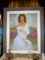 Oil Painting in a frame, depicts a woman in a white dress.