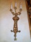 Pair of Antique bronze wall sconces, features a boy holding up 5 candle looking lights.