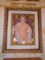 Oil painting in a gold frame, depicts a woman. Hand signed by the artist Arbe.